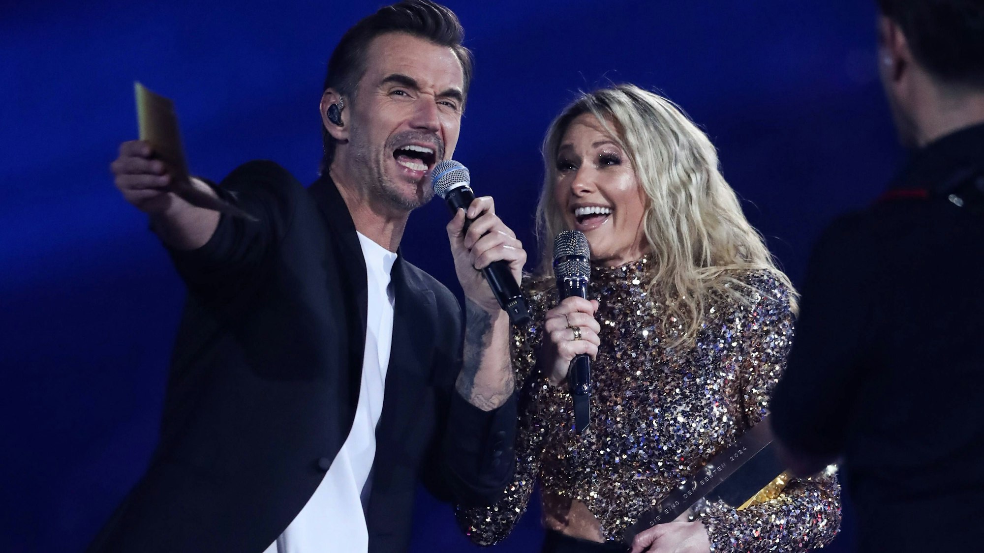 Moderator Florian Silbereisen mit Helene Fischer bei der ARD Live Show „Schlagerchampions - Das große Fest der Besten“ aus dem Velodrom in Berlin. (Archivbild)
