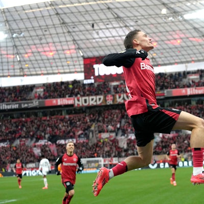 Leverkusen's Florian Wirtz, celebrates after scoring the first goal during the German Bundesliga soccer match between Bayer Leverkusen and St. Pauli at the BayArena in Leverkusen, Germany, Saturday, Dec. 7, 2024. (AP Photo/Martin Meissner)