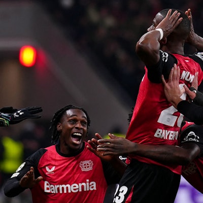 Bayer Leverkusen's French forward #23 Nordi Mukiele (C) celebrates scoring the first goal during the UEFA Champions League football match between Bayer 04 Leverkusen and Inter Milan in Leverkusen, western Germany on December 10, 2024. (Photo by Pau BARRENA / AFP)