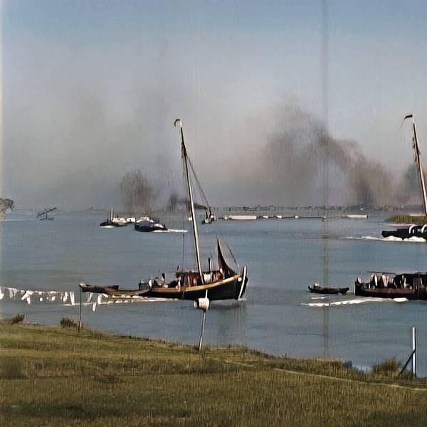 Das Bild zeigt eine historische Aufnahme von Schiffen auf dem Rhein.