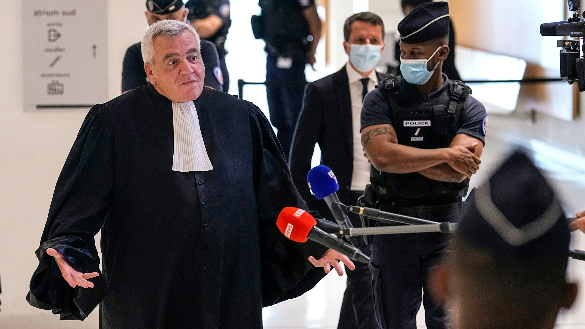 FILE - Thierry Herzog, lawyer of former French President Nicolas Sarkozy, speaks to the media after the verdict was announcement at Paris' courthouse, Thursday, Sept. 30, 2021. (AP Photo/Michel Euler, File)