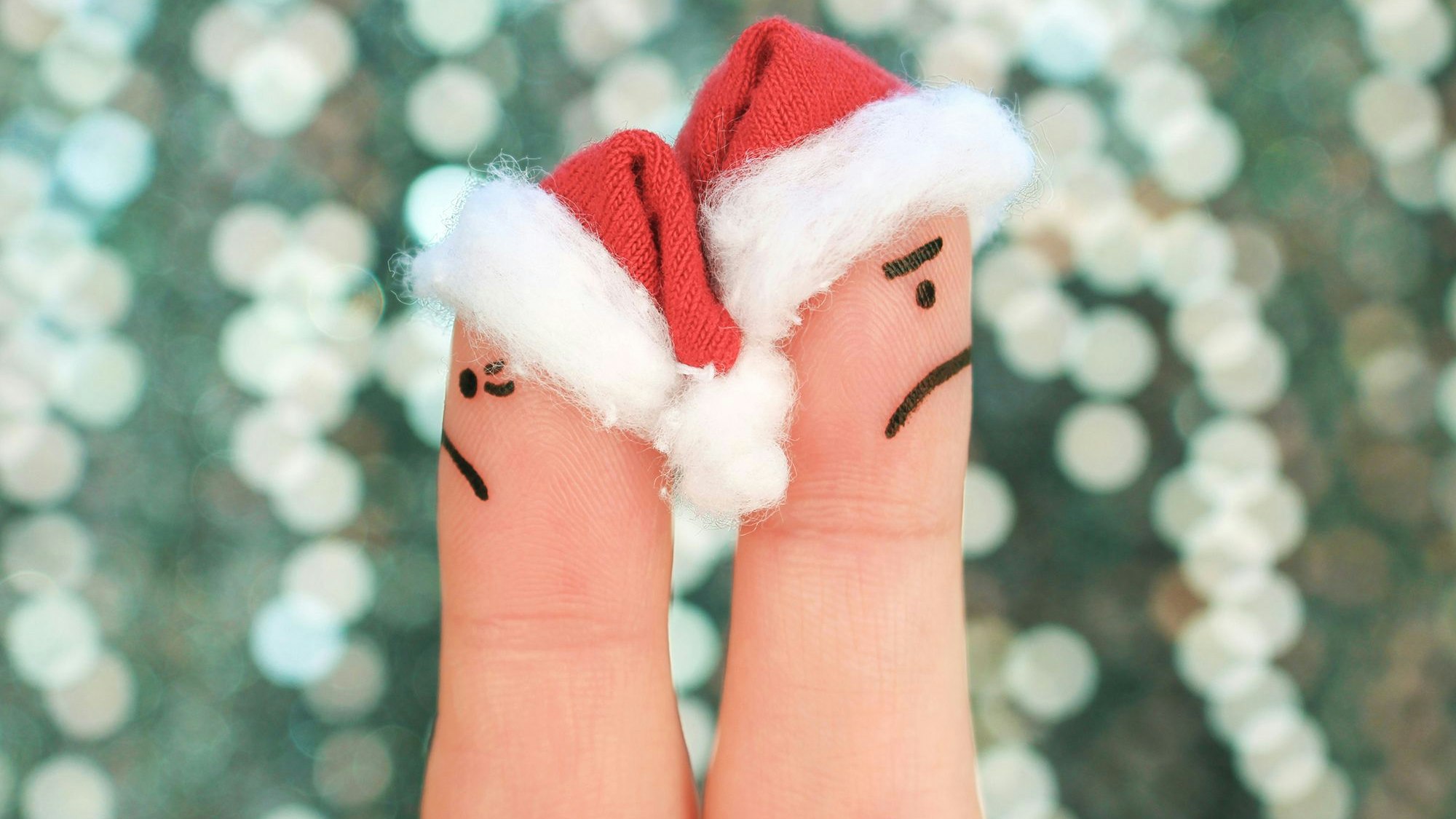 Fingers art of couple celebrates Christmas. Concept of man and woman during quarrel in New Year., Fingers art of couple celebrates Christmas. Concept of man and woman during quarrel in New Year. Couple after an argument looking in different directions