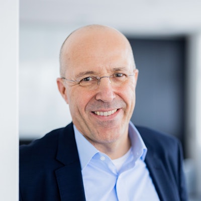 Jan Kunath, stellvertretender Vorstandsvorsitzender und zuständig für Handel International und IT/Rewe Systems, aufgenommen in seinem Büro