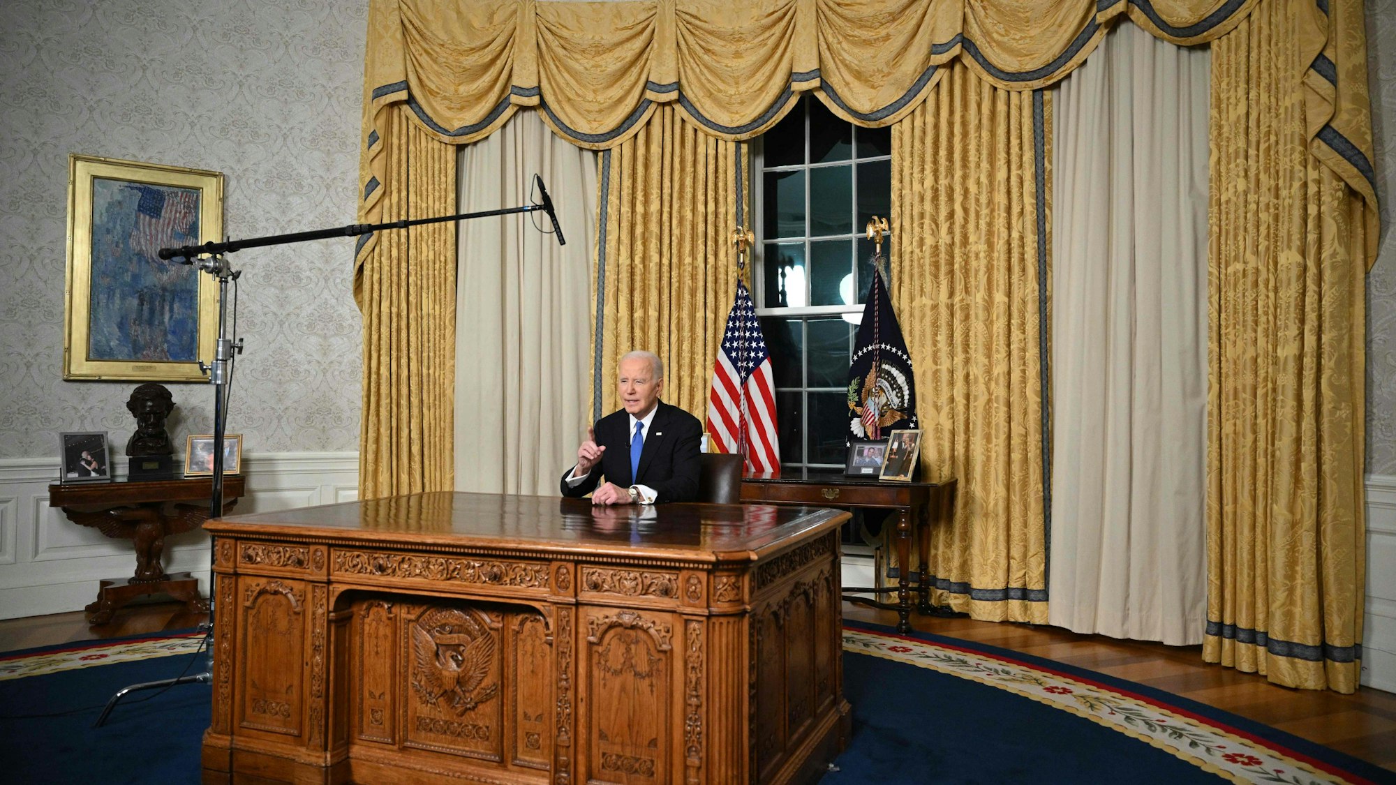 TOPSHOT - US President Joe Biden delivers his farewell address to the nation from the Oval Office of the White House in Washington, DC, on January 15, 2025. (Photo by Mandel NGAN / POOL / AFP)
