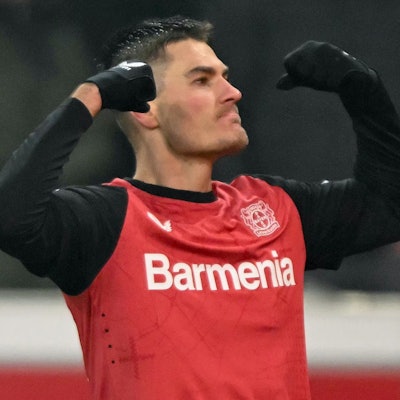 Bayer Leverkusen's Czech forward #14 Patrik Schick celebrates scoring the 2-2 goal during the German Cup (DFB Pokal) quarter-final football match Bayer 04 Leverkusen vs FC Cologne in Leverkusen, western Germany on February 5, 2025. (Photo by INA FASSBENDER / AFP) / DFL REGULATIONS PROHIBIT ANY USE OF PHOTOGRAPHS AS IMAGE SEQUENCES AND/OR QUASI-VIDEO ALTERNATIVE CROP