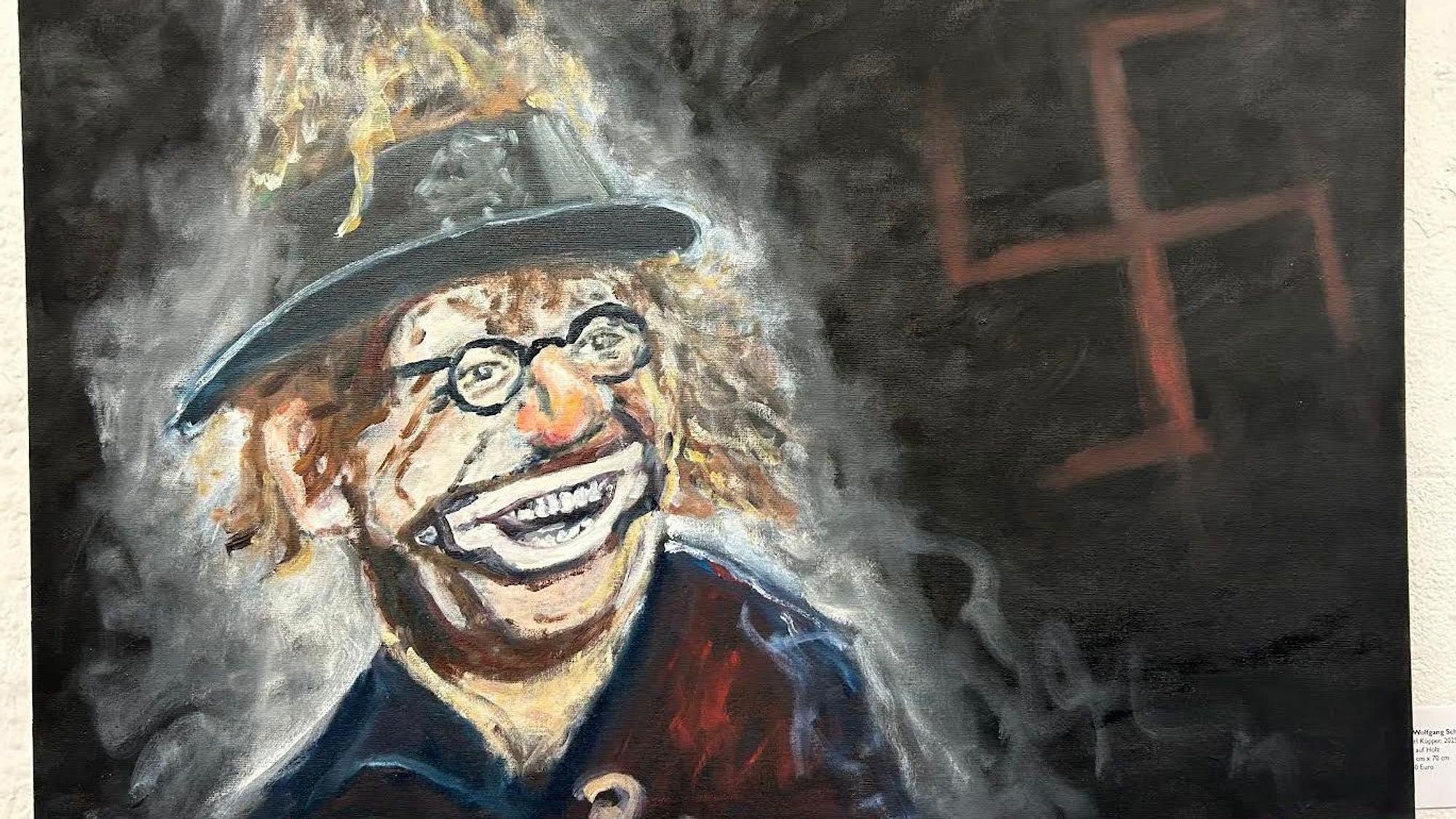 Ein Bild zeigt einen Clown mit Hakenkreuz im Hintergrund.