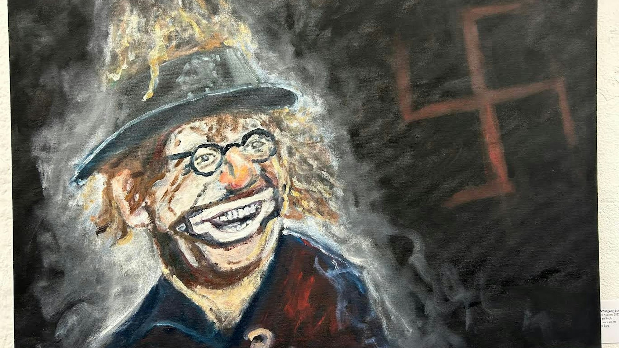 Ein Bild zeigt einen Clown mit Hakenkreuz im Hintergrund.