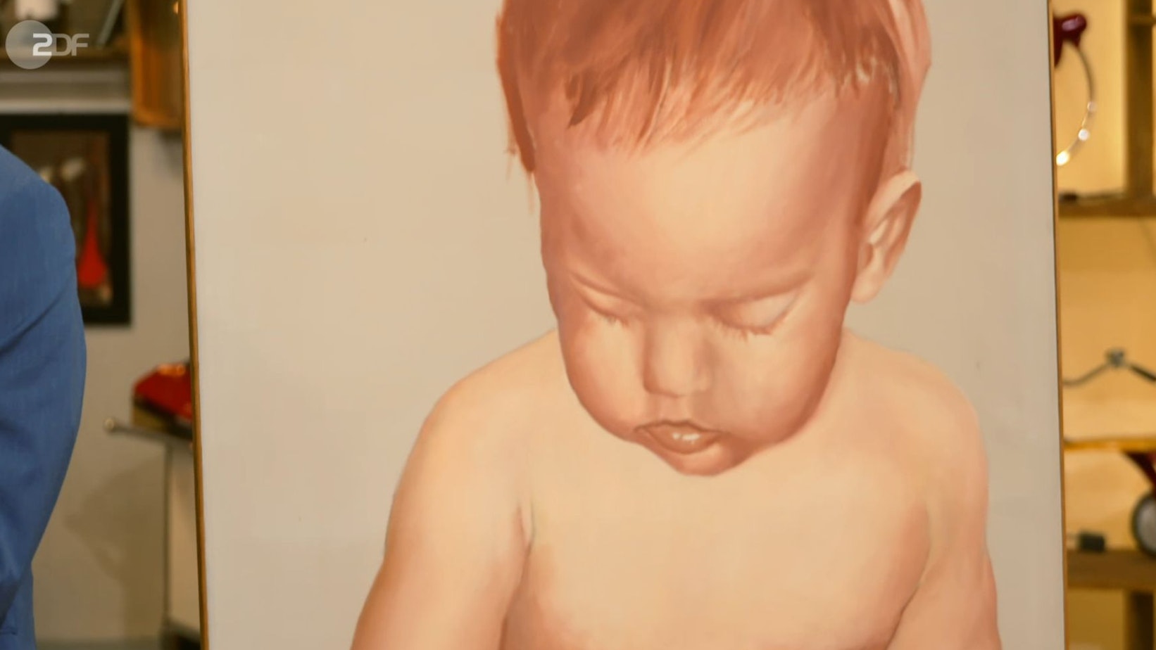 Der obere Teil des Gemäldes mit dem Baby ist in sanften Tönen gehalten.