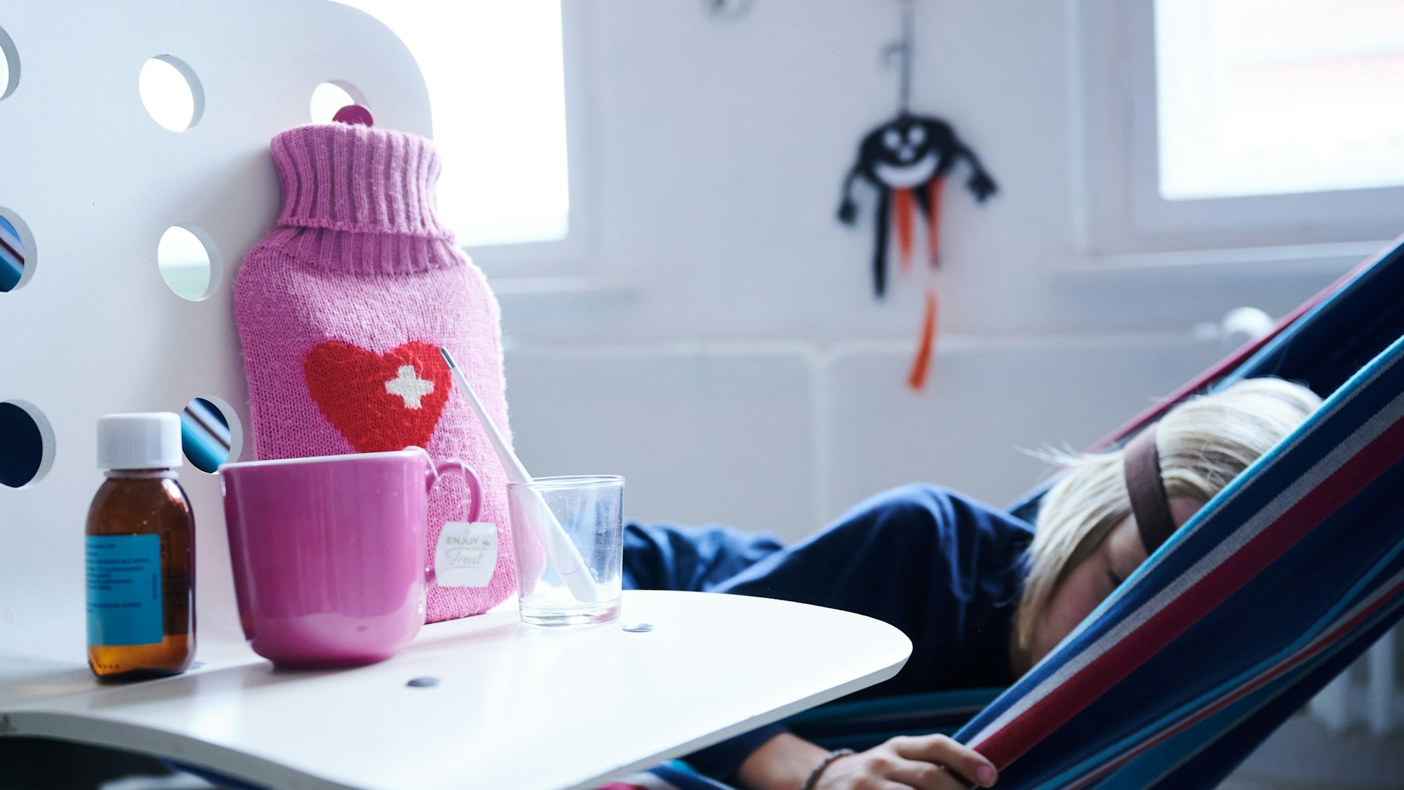 Krankes Kind in Hängematte