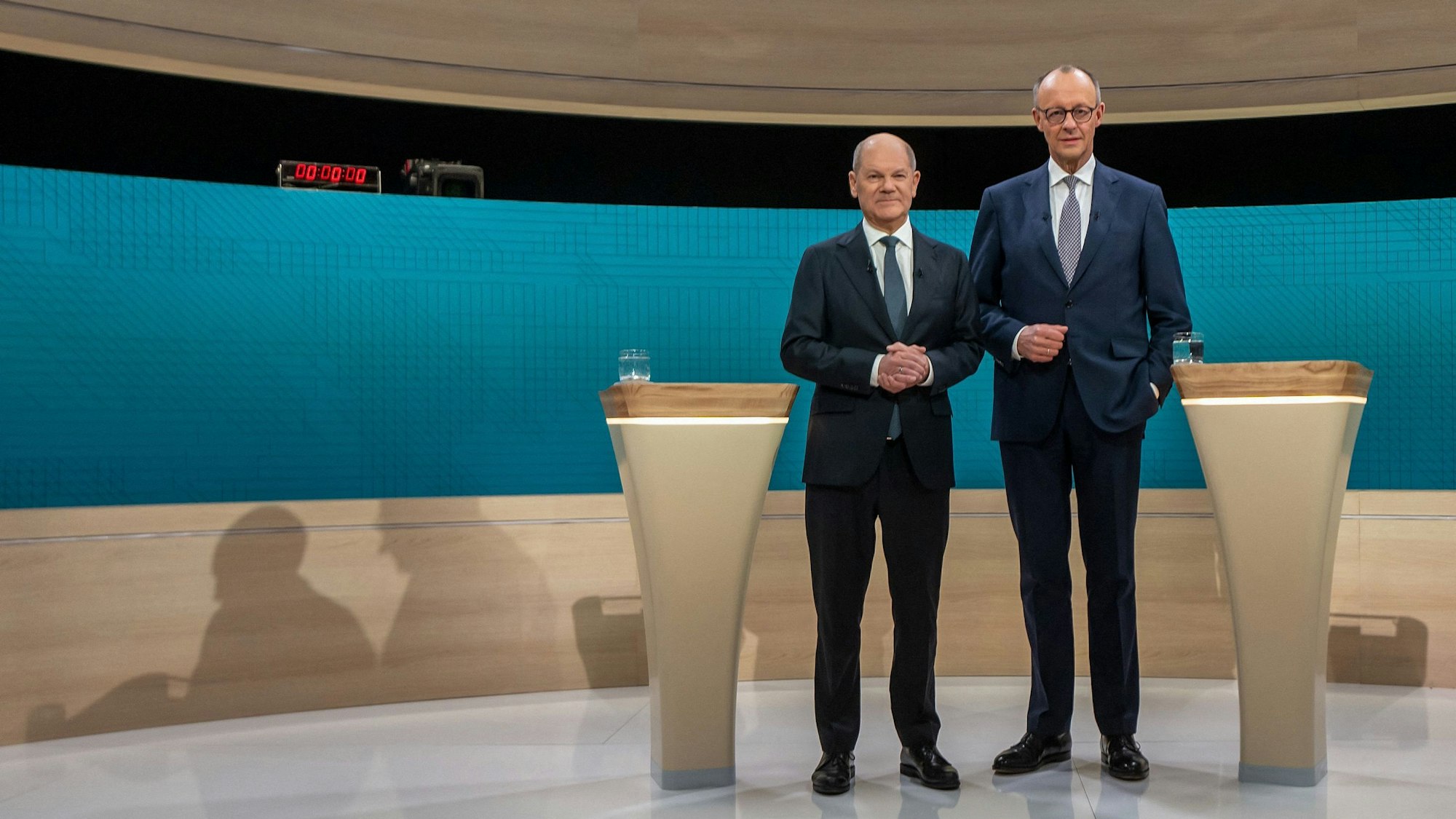 Olaf Scholz (l.) und Friedrich Merz.