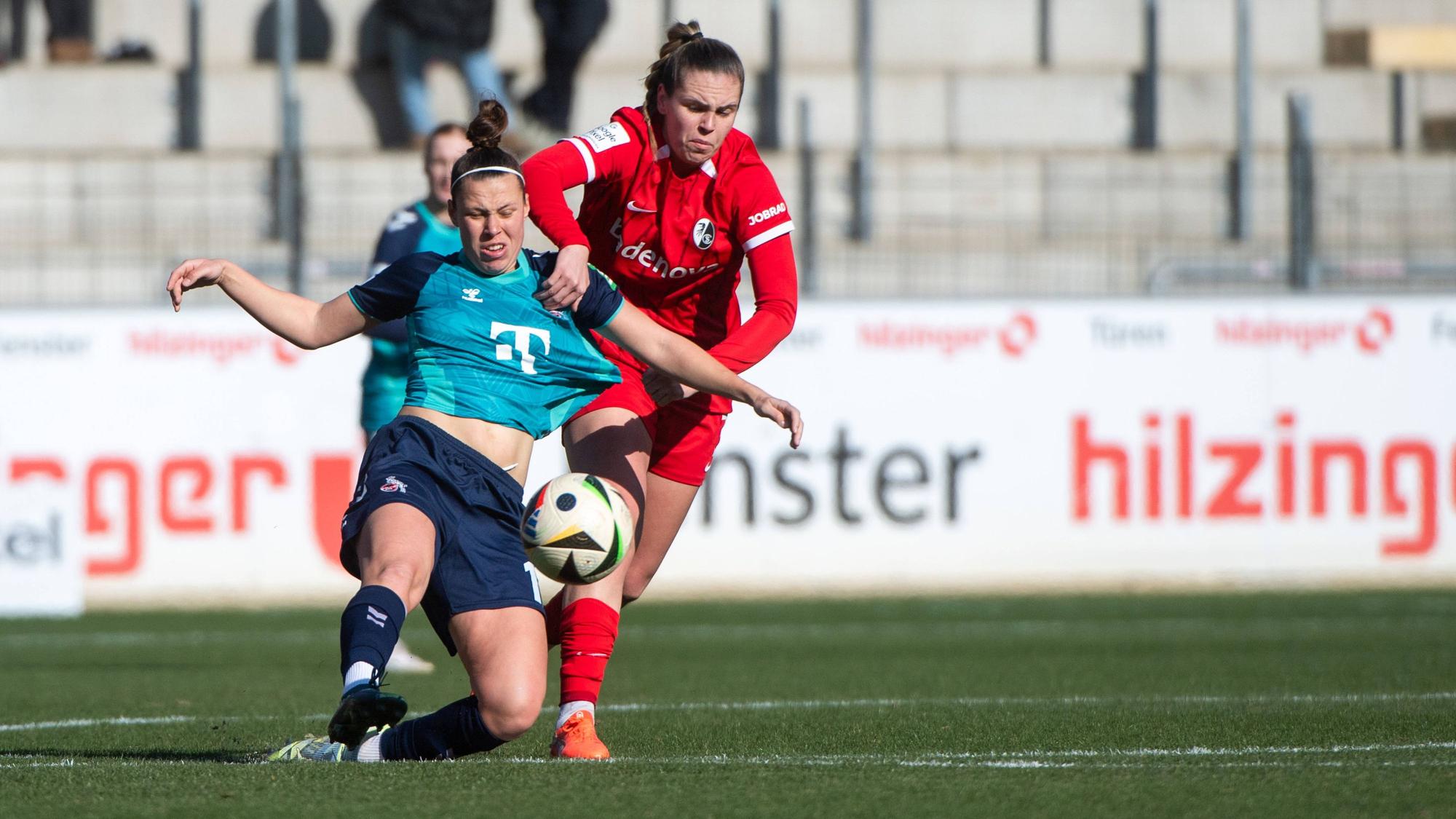 Nicole Billa FC Koeln, 17 im Zweikampf mit Alina Axtmann SC Freiburg, 03, GER, SC Freiburg vs 1. FC Koeln, Fussball Google Pixel Frauen Bundesliga, 15. Spieltag, Saison 2024/2025, 15.02.2025 DFB regulations prohibit any use of photographs as image sequences and/or quasi-video GER, SC Freiburg vs 1. FC Koeln, Fussball Google Pixel Frauen Bundesliga, 15. Spieltag, Saison 2024/2025, 15.02.2025 Freiburg *** Nicole Billa FC Koeln, 17 in duel with Alina Axtmann SC Freiburg, 03 , GER, SC Freiburg vs 1 FC Koeln, Fussball Google Pixel Frauen Bundesliga, 15 Spieltag, Saison 2024 2025, 15 02 2025 DFB regulations prohibit any use of photographs as image sequences and or quasi video GER, SC Freiburg vs 1 FC Koeln, Fussball Google Pixel Frauen Bundesliga, 15 Spieltag, Saison 2024 2025, 15 02 2025 Freiburg Copyright: xEibner-Pressefoto/Memmlerx EP_MMR