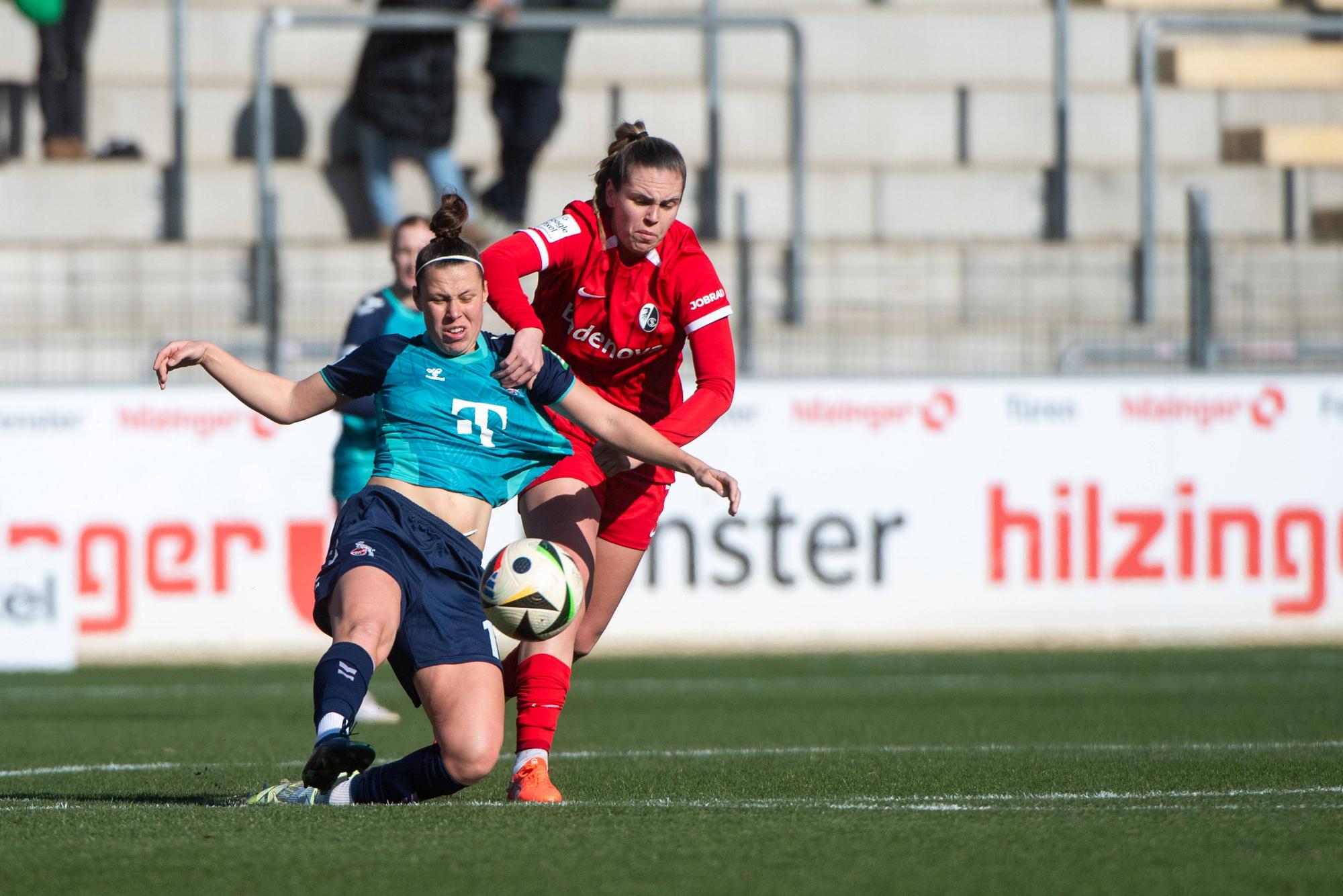 Nicole Billa FC Koeln, 17 im Zweikampf mit Alina Axtmann SC Freiburg, 03, GER, SC Freiburg vs 1. FC Koeln, Fussball Google Pixel Frauen Bundesliga, 15. Spieltag, Saison 2024/2025, 15.02.2025 DFB regulations prohibit any use of photographs as image sequences and/or quasi-video GER, SC Freiburg vs 1. FC Koeln, Fussball Google Pixel Frauen Bundesliga, 15. Spieltag, Saison 2024/2025, 15.02.2025 Freiburg *** Nicole Billa FC Koeln, 17 in duel with Alina Axtmann SC Freiburg, 03 , GER, SC Freiburg vs 1 FC Koeln, Fussball Google Pixel Frauen Bundesliga, 15 Spieltag, Saison 2024 2025, 15 02 2025 DFB regulations prohibit any use of photographs as image sequences and or quasi video GER, SC Freiburg vs 1 FC Koeln, Fussball Google Pixel Frauen Bundesliga, 15 Spieltag, Saison 2024 2025, 15 02 2025 Freiburg Copyright: xEibner-Pressefoto/Memmlerx EP_MMR