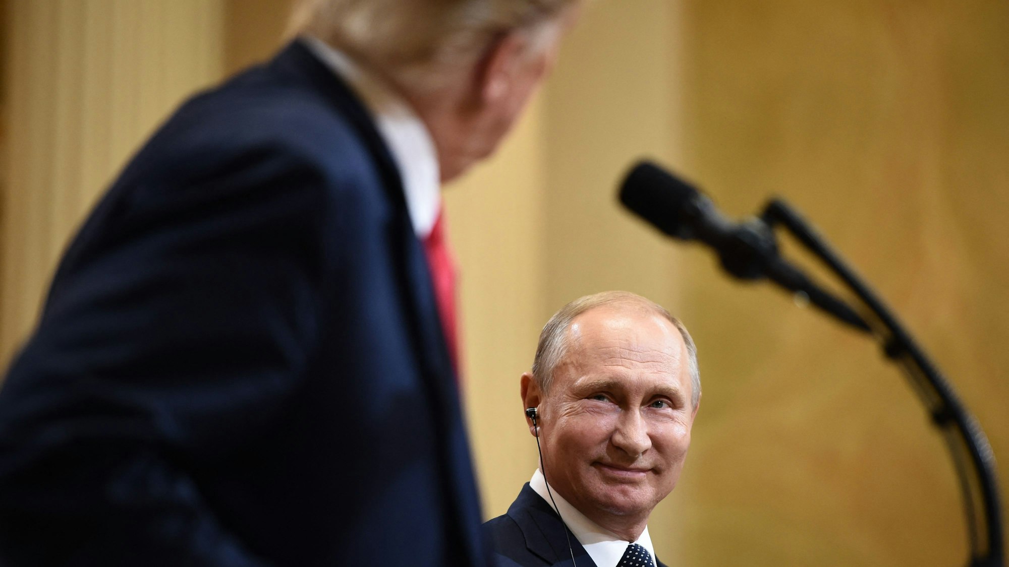 US President Donald Trump and Russia's President Vladimir Putin attend a joint press conference after a meeting at the Presidential Palace in Helsinki, on July 16, 2018.