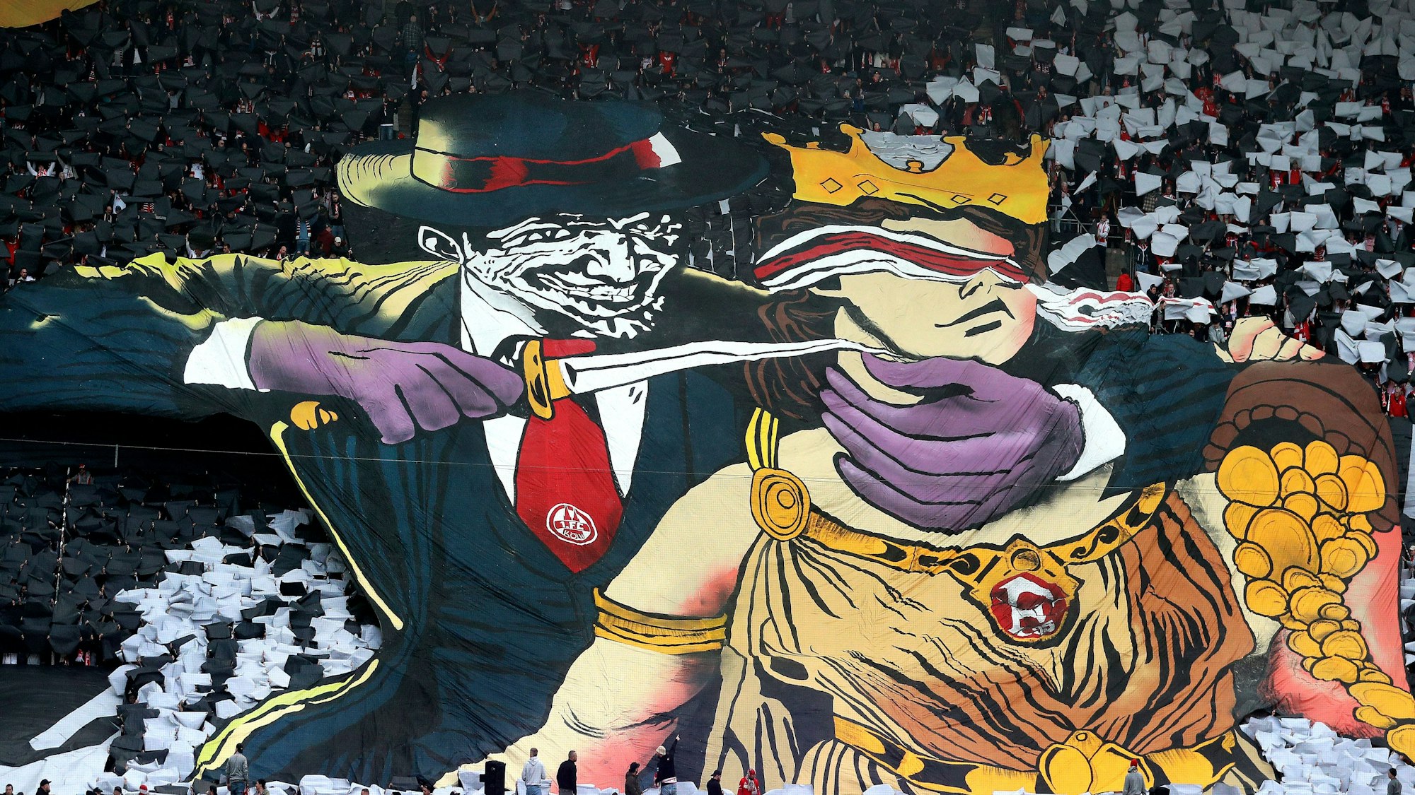 1. FC Köln vs. Fortuna Düsseldorf, 23. Spieltag, 23.02.2025, 13.30 Uhr, umstrittene Choreo der Ultras auf der Südtribüne (1. FC Köln), Bild: Herbert Bucco