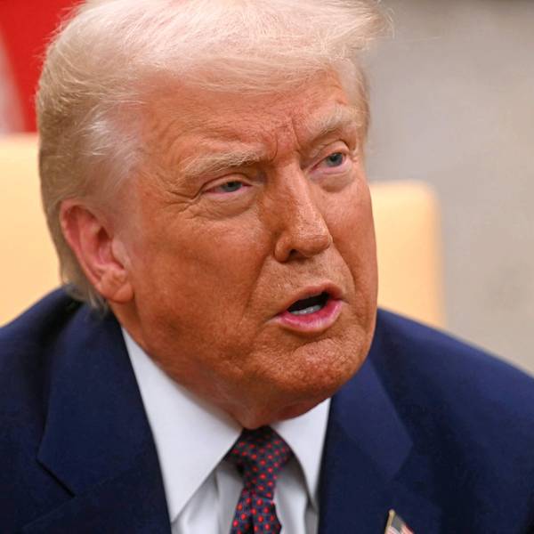 US President Donald Trump meets with unseen Indian Prime Minister Narendra Modi, in the Oval Office of the White House in Washington, DC, on February 13, 2025. (Photo by Jim WATSON / AFP)