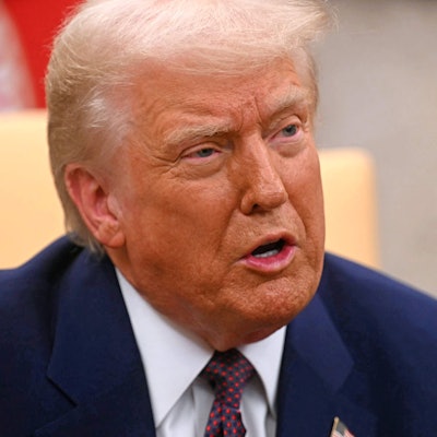 US President Donald Trump meets with unseen Indian Prime Minister Narendra Modi, in the Oval Office of the White House in Washington, DC, on February 13, 2025. (Photo by Jim WATSON / AFP)