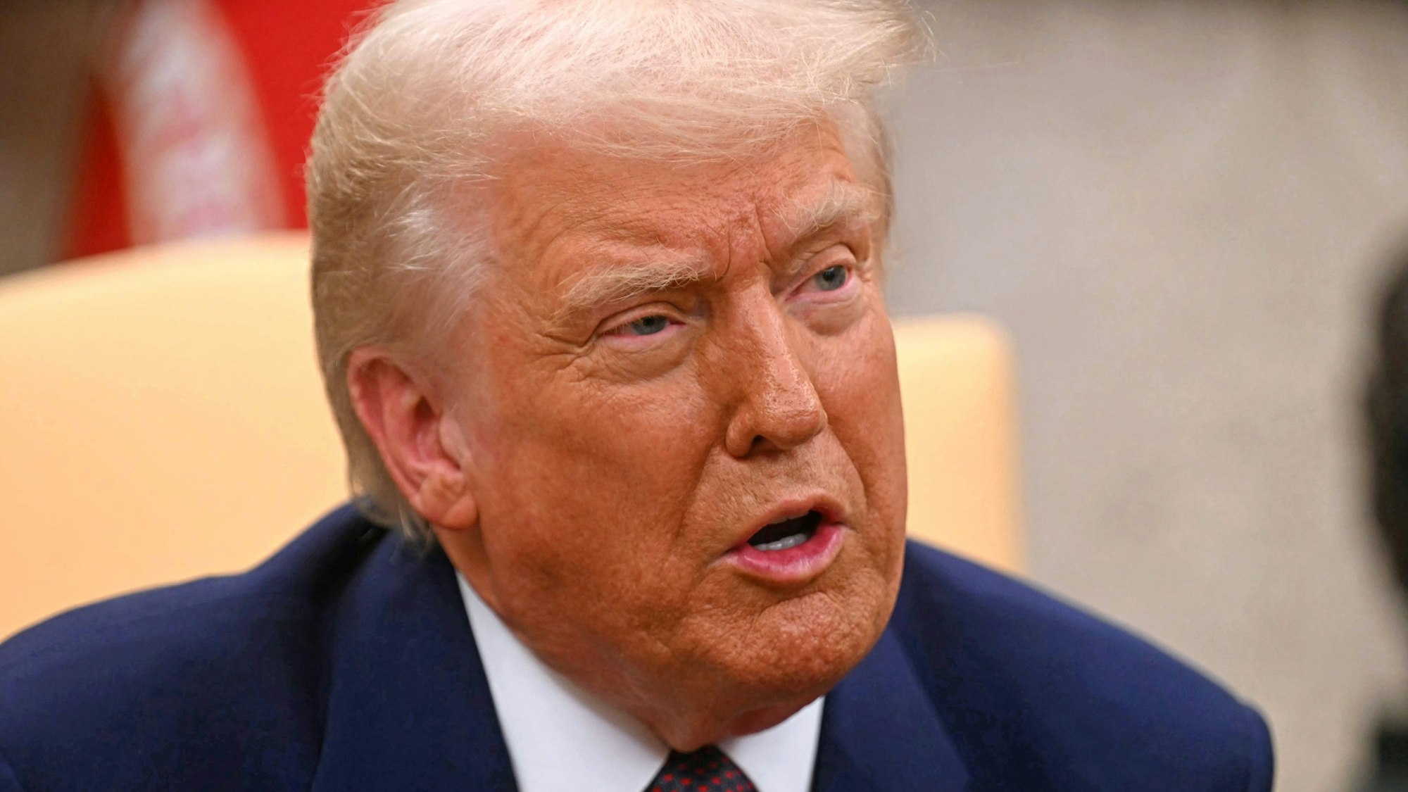 US President Donald Trump meets with unseen Indian Prime Minister Narendra Modi, in the Oval Office of the White House in Washington, DC, on February 13, 2025. (Photo by Jim WATSON / AFP)