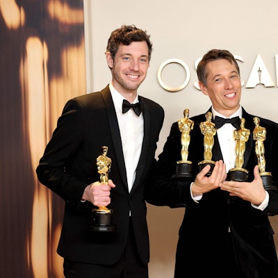 HOLLYWOOD, CALIFORNIA - MARCH 02: (L-R) Alex Coco, Sean Baker, and Samantha Quan, winners of the Best Picture for Anora, pose in the press room during the 97th Annual Oscars at Ovation Hollywood on March 02, 2025 in Hollywood, California. Mike Coppola/Getty Images/AFP (Photo by Mike Coppola / GETTY IMAGES NORTH AMERICA / Getty Images via AFP)