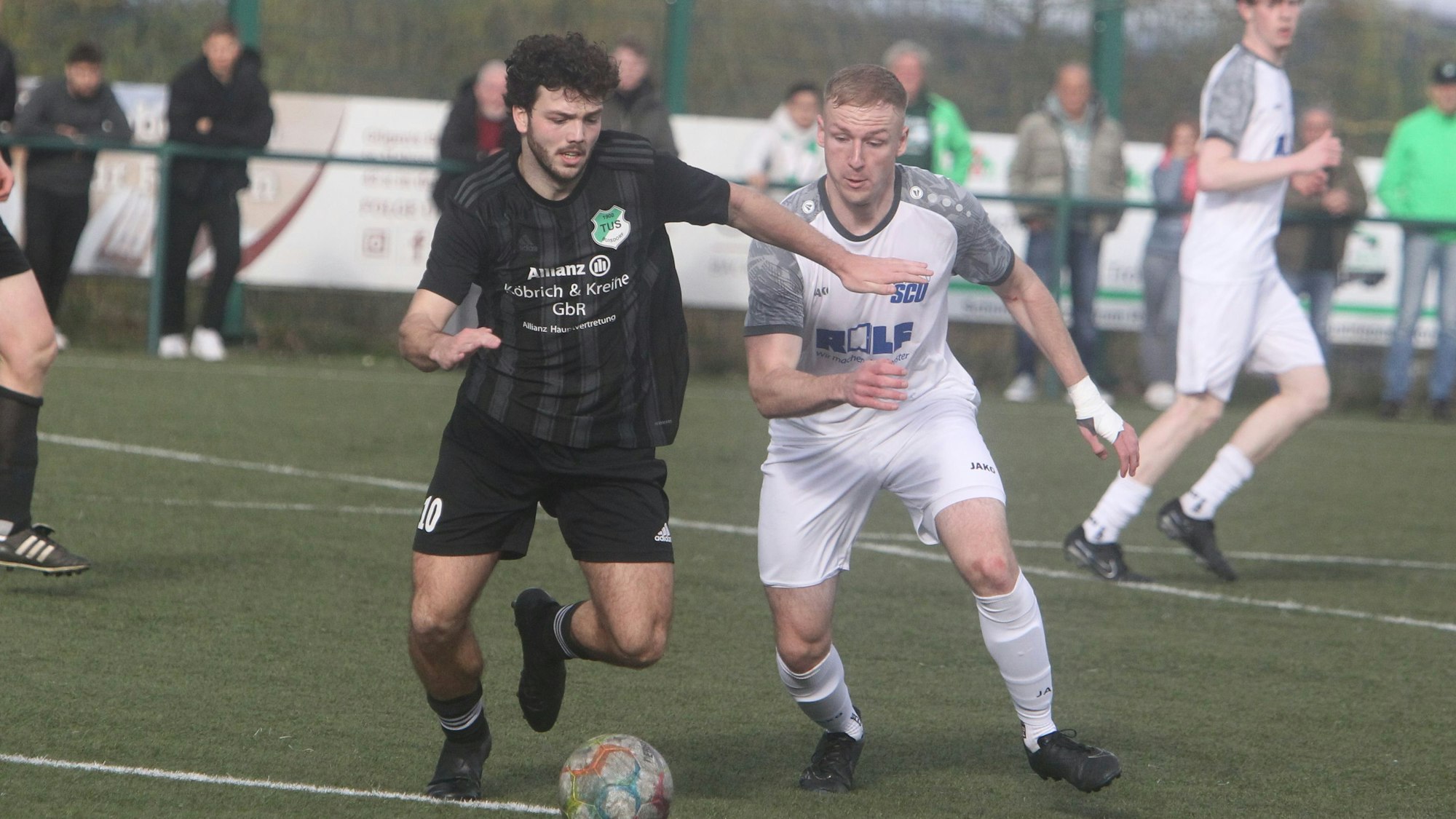 Julius Hübgen (links)