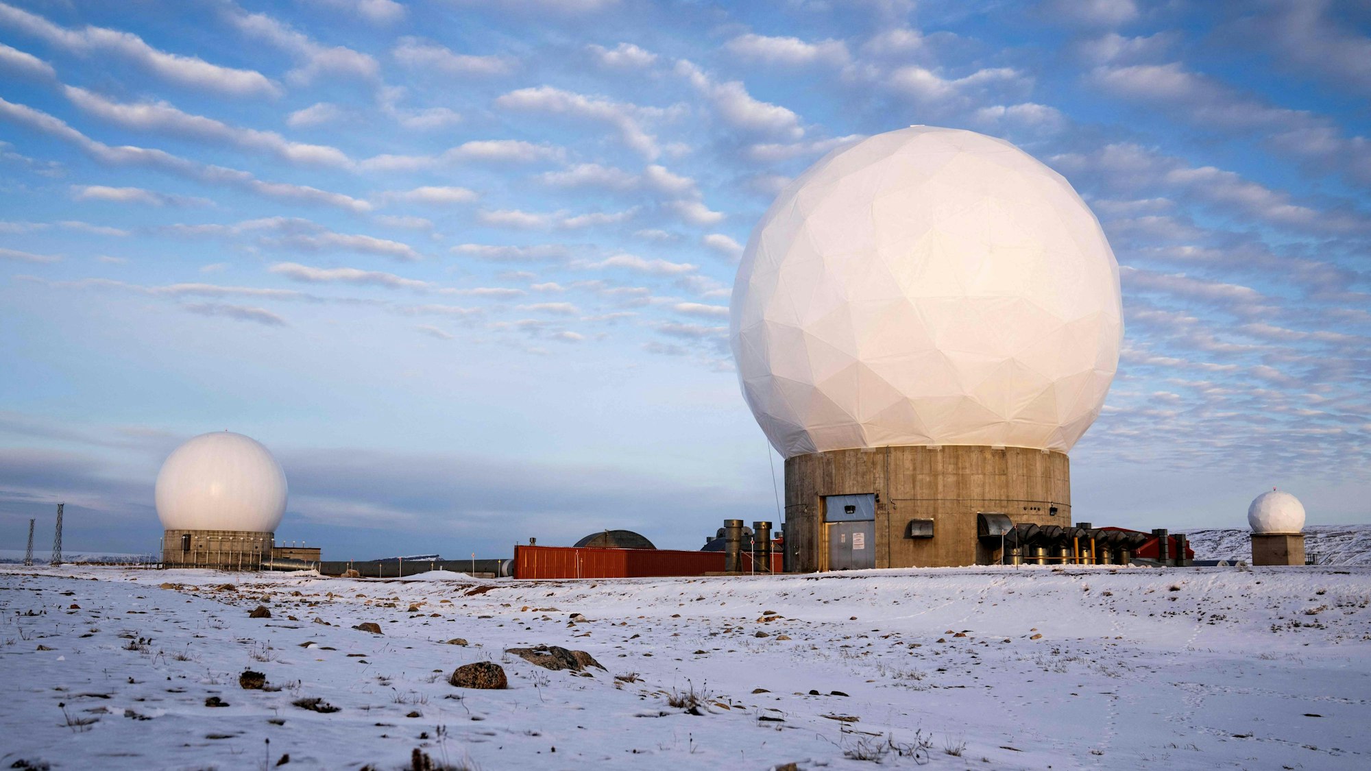 (FILES) Pituffik Space Base, formerly Thule Air Base, with the domes of the Thule Tracking Station, is pictured in northern Greenland on October 4, 2023. Denmark's foreign minister on March 26, 2025 welcomed Washington's decision to limit a US delegation's visit to Greenland to a US military base, after previous plans sparked criticism. US Vice President JD Vance would on March 28, 2025 accompany his wife Usha to the Pituffik Space Base in Greenland, the Danish self-governing island coveted by the US President. (Photo by Thomas Traasdahl / Ritzau Scanpix / AFP) / Denmark OUT