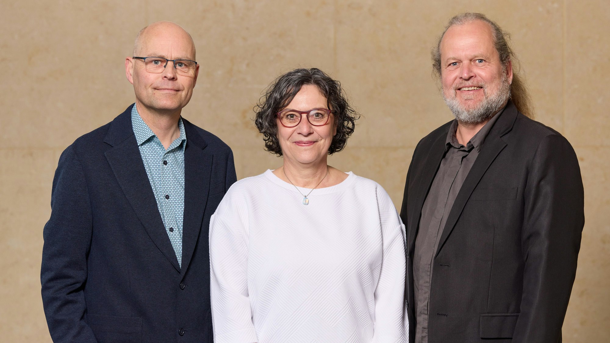 Martin Lorek, Monika Cremer und Matthias Nowroth bei der Preisverleihung in Berlin.