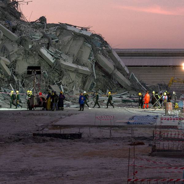 Rescue teams operate at a construction site where a building collapsed in Bangkok on March 28, 2025, following an earthquake. A powerful earthquake killed more than 20 people across Myanmar and Thailand on March 28, toppling buildings and bridges and trapping over 80 workers in an under-construction skyscraper in Bangkok. (Photo by Chanakarn Laosarakham / AFP)