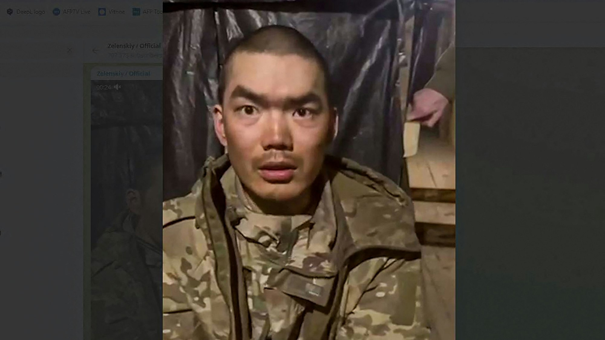 TOPSHOT - This handout video grab published on the official Telegram channel of Ukrainian President Volodymyr Zelensky on April 8, 2025 shows, according to the Ukrainian president, one of two Chinese soldiers he said were captured by Ukrainian forces in the Donetsk region. Ukrainian President Volodymyr Zelensky said on April 8, 2025 that Ukrainian troops had captured two Chinese citizens fighting alongside Russian forces, adding that Kyiv would demand an explanation from Beijing and a reaction from its allies. (Photo by Handout / Telegram / @Volodymyr Zelensky / AFP) / RESTRICTED TO EDITORIAL USE - MANDATORY CREDIT "AFP PHOTO / Official Telegram channel of Ukrainian President Volodymyr Zelensky" - NO MARKETING NO ADVERTISING CAMPAIGNS - DISTRIBUTED AS A SERVICE TO CLIENTS - AFP CANNOT INDEPENDENTLY VERIFY THE AUTHENTICITY OR LOCATION, DATE, AND CONTENT OF THESE IMAGES. /