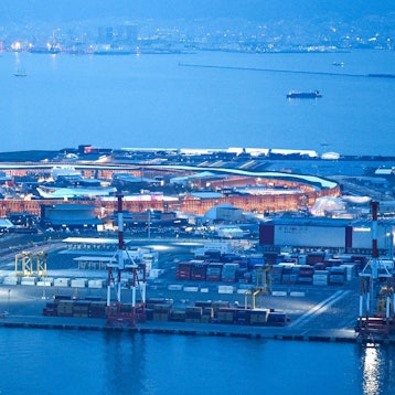 This overview image shows the "Grand Ring", made of wood, lit up at dusk on the eve of the opening of the 2025 Osaka Expo in Osaka on April 12, 2025. (Photo by JIJI PRESS / AFP) / Japan OUT