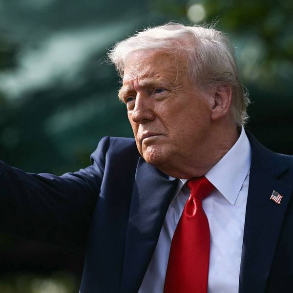 US President Donald Trump gestures after hosting the 2025 College Football National Champions, Ohio State Buckeyes, celebrating the team's title-winning season with a ceremony on the South Lawn of the White House in Washington, DC, April 14, 2025. (Photo by Brendan SMIALOWSKI / AFP) / ALTERNATE CROP