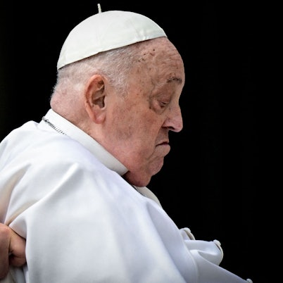 Pope Francis makes a surprise appearance at the end of the mass for Palm Sunday at St Peter's square in the Vatican on April 13, 2025. (Photo by Tiziana FABI / AFP)