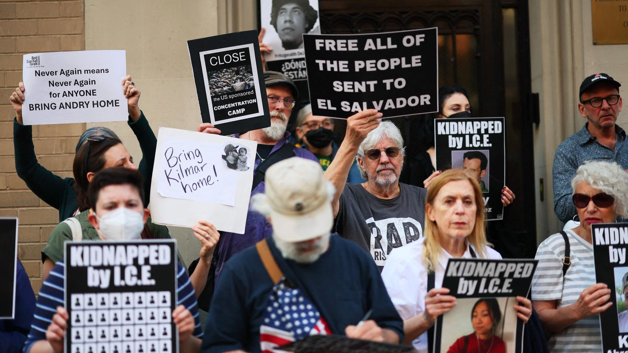 NEW YORK, NEW YORK - APRIL 24: Demonstrators gather to protest against the deportation of immigrants to El Salvador outside the Permanent Mission of El Salvador to the United Nations on April 24, 2025 in New York City. Many of the deportees now detained at El Salvadors Terrorism Confinement Center (CECOT) were sent there without court hearings under the Alien Enemies Act after a deal was brokered by U.S. President Donald Trump and El Salvadors President Nayib Bukele. A federal judge in Maryland recently ordered the return of a 20-year-old Venezuelan man who was deported, citing a prior ruling involving Maryland man Kilmar Abrego Garcia who was mistakenly deported to his native El Salvador. The Trump administration has stated the justification as gang affiliation and as part of a broader deportation strategy. Michael M. Santiago/Getty Images/AFP (Photo by Michael M. Santiago / GETTY IMAGES NORTH AMERICA / Getty Images via AFP)