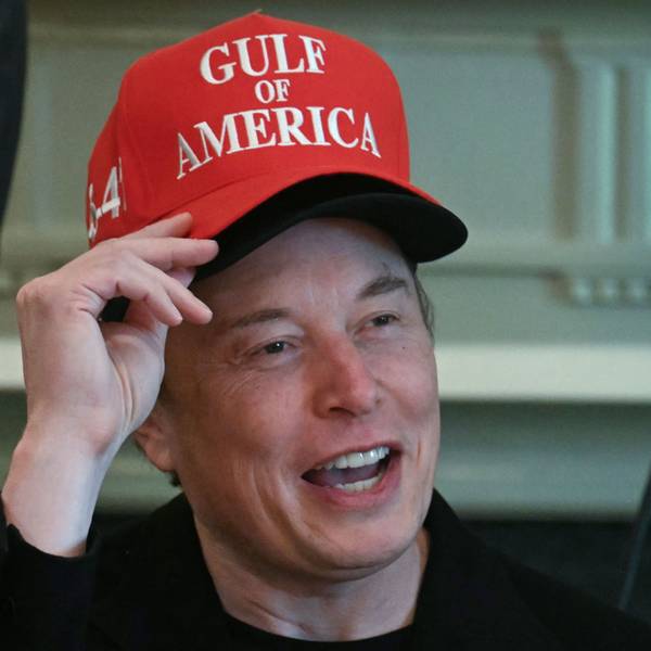 Elon Musk, wearing two hats, speaks during a cabinet meeting in the Cabinet Room of the White House in Washington, DC, on April 30, 2025. (Photo by Jim WATSON / AFP)