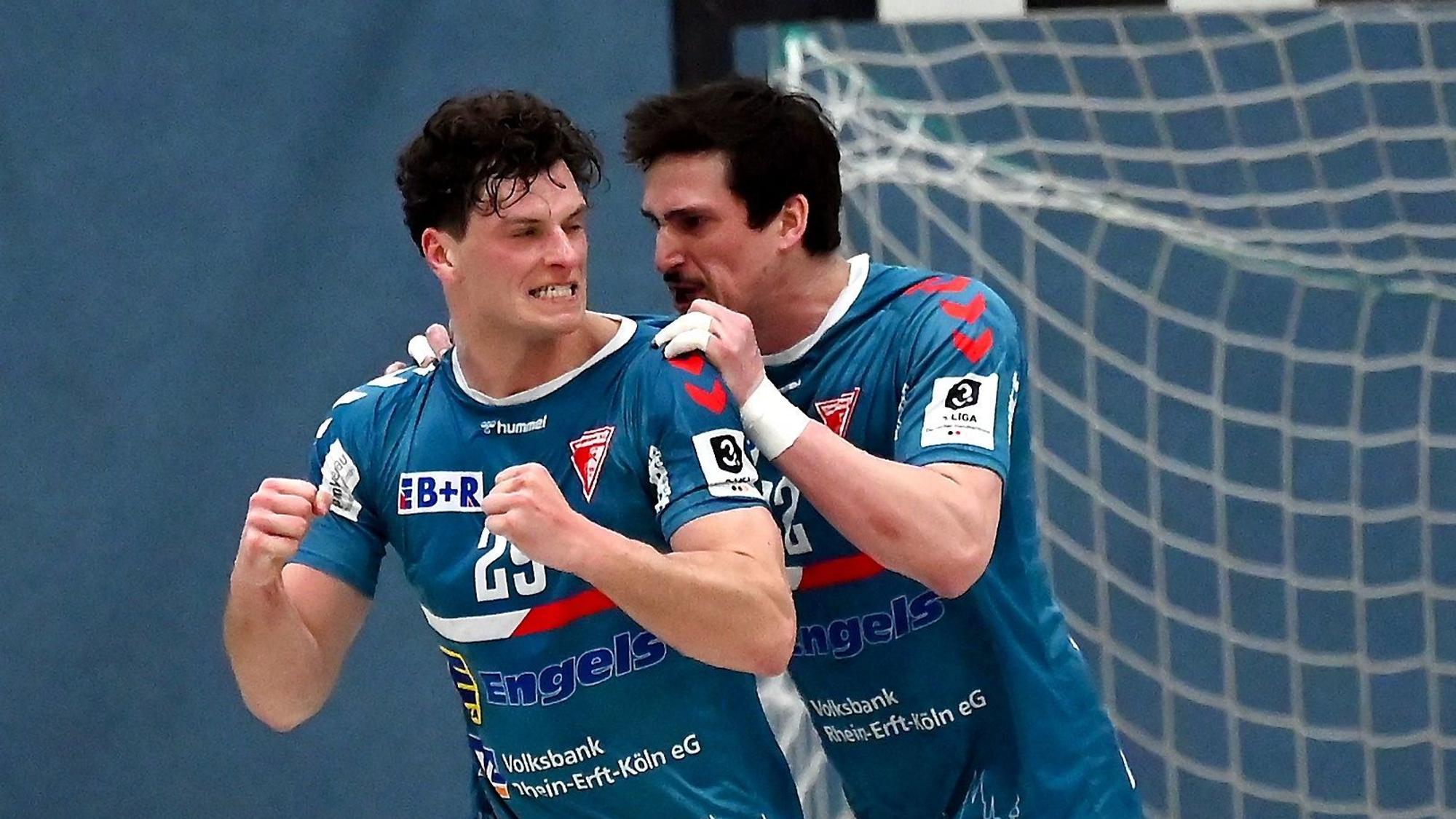 24.03.2023, Handball-Bergische Panther - Longericher SC
links: Lukas Schulz (Longerich)
rechts: Christopher Wolf (Longerich)
Foto: Uli Herhaus