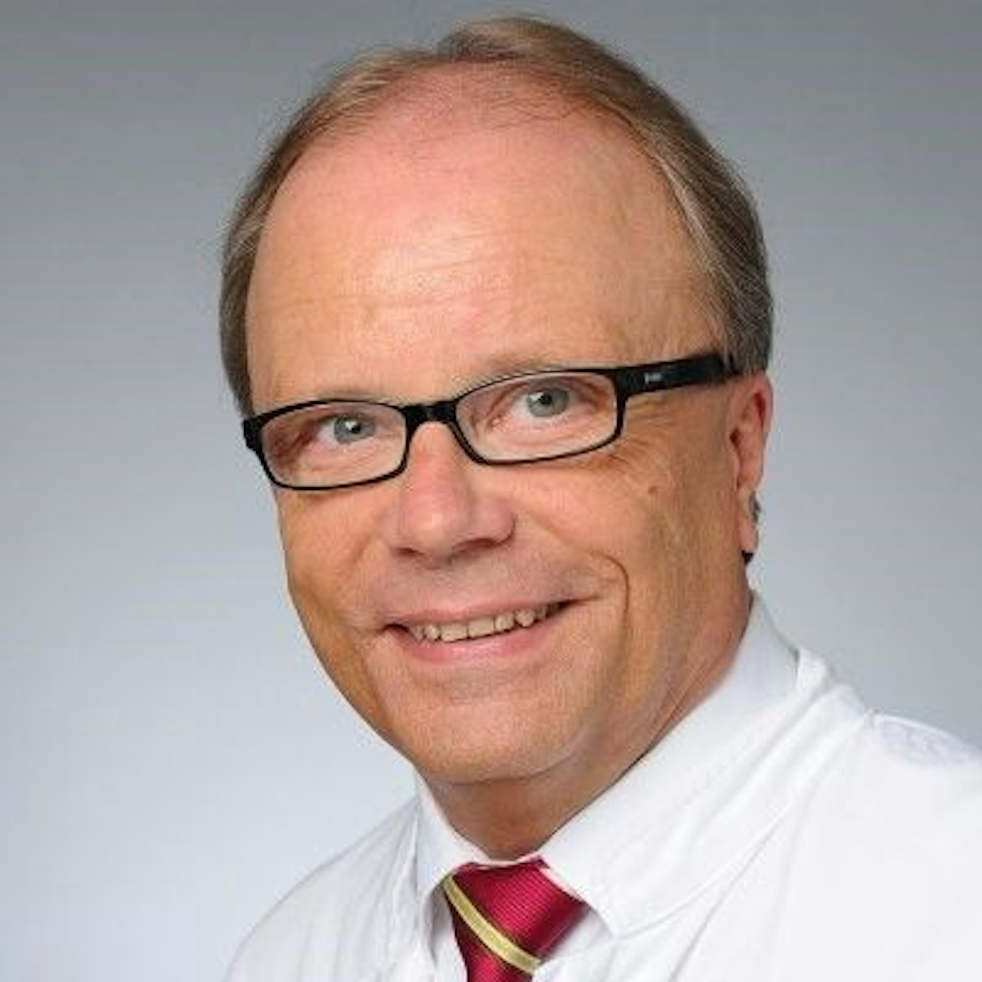 Herr Böttiger ist im Porträt zu sehen.