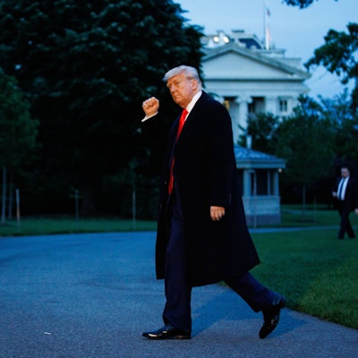 United States President Donald J Trump gestures as he walks towards the White House after landing on the South Lawn of the White House in Washington, DC, US, aboard Marine One on May 22, 2025. President Trump is returning from Trump National Golf Club in Virginia after a private dinner. Copyright: xSamuelxCorumx/xPoolxviaxCNPx/MediaPunchx