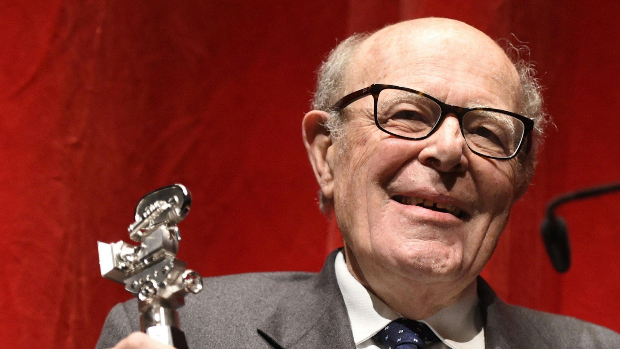 (FILES) French director Marcel Ophuels speaks after being awarded the Berlinale Camera at the 65th Berlin International Film Festival Berlinale in Berlin, on February 11, 2015. Oscar-winning director Marcel Ophüls has died at the age of 97 on May 24, 2025, is grandson announced on May 26, 2025. (Photo by Odd ANDERSEN / AFP)