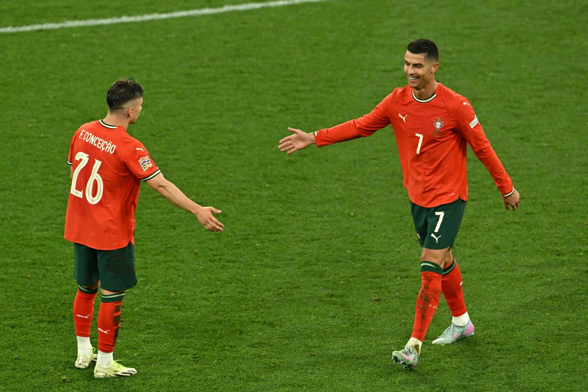 Portugals Torschützen und Matchwinner: Joker Francisco Conceição (l) und Kapitän Cristiano Ronaldo.