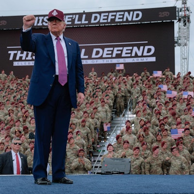 FORT BRAGG, NORTH CAROLINA - JUNE 10: U.S. President Donald Trump pumps his fist as he leaves the stage during a rally with U.S. Army troops on June 10, 2025 at Fort Bragg, North Carolina. Trump is traveling to Fort Bragg Army base to observe a military demonstration and give remarks in honor of the U.S. Armys 250th anniversary.   Anna Moneymaker/Getty Images/AFP (Photo by Anna Moneymaker / GETTY IMAGES NORTH AMERICA / Getty Images via AFP)