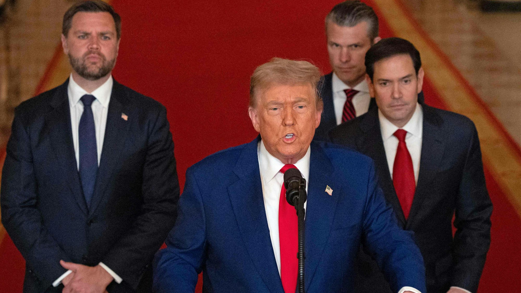 US President Donald Trump addresses the nation, alongside US Vice President JD Vance (L), US Secretary of State Marco Rubio (2nd R) and US Secretary of Defense Pete Hegseth (R), from the White House in Washington, DC on June 21, 2025, following the announcement that the US bombed nuclear sites in Iran. President Donald Trump said June 21, 2025 the US military has carried out a "very successful attack" on three Iranian nuclear sites, including the underground uranium enrichment facility at Fordo. "We have completed our very successful attack on the three Nuclear sites in Iran, including Fordow, Natanz, and Esfahan," Trump said in a post on his Truth Social platform. (Photo by CARLOS BARRIA / POOL / AFP)