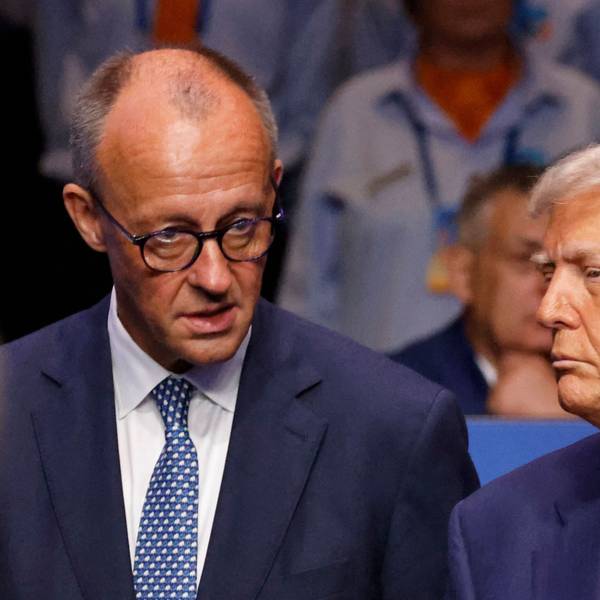 Germanys Chancellor Friedrich Merz (L) speaks with US President Donald Trump before the start of the North Atlantic Council plenary meeting at the North Atlantic Treaty Organisation (NATO) summit in The Hague on June 25, 2025. (Photo by Ludovic MARIN / POOL / AFP)