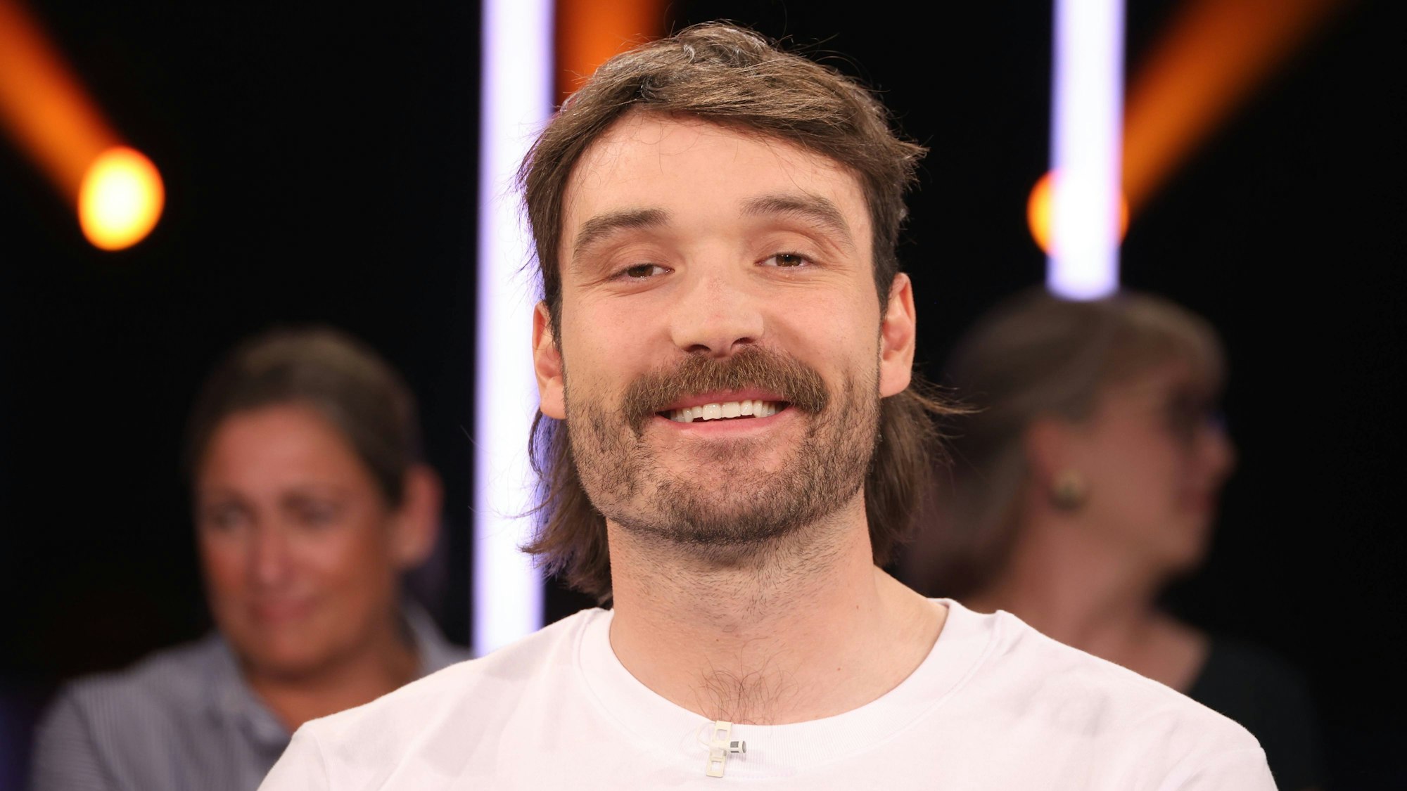 Portrait von Rick Zabel bei einem Talkshow-Auftritt