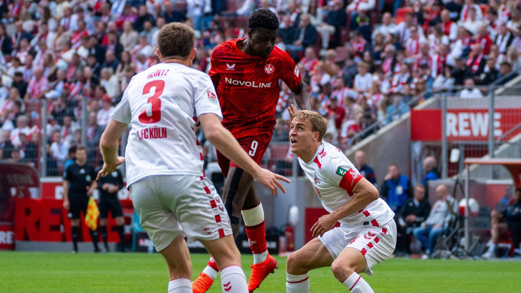 Ragnar Ache im letzten Spiel der Zweitliga-Saison gegen die FC-Verteidiger Timo Hübers und Dominique Heintz