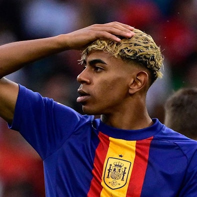 (FILES) Spain's forward #19 Lamine Yamal warms up prior to the UEFA Nations League final football match between Portugal and Spain in Munich, southern Germany on June 8, 2025. Barcelona star Lamine Yamal is facing an investigation regarding the presence of a group of people with dwarfism as entertainers at his 18th birthday party last weekend, Spain's Ministry of Social Rights told AFP Tuesday.
The winger celebrated with a private event in Olivella, around 50 kilometres west of Barcelona, which the ministry asked the prosecutor's office to probe, following a complaint from the Association for People with Achondroplasia and Other Skeletal Dysplasias with Dwarfism (ADEE). (Photo by John MACDOUGALL / AFP) / ALTERNATIVE CROP