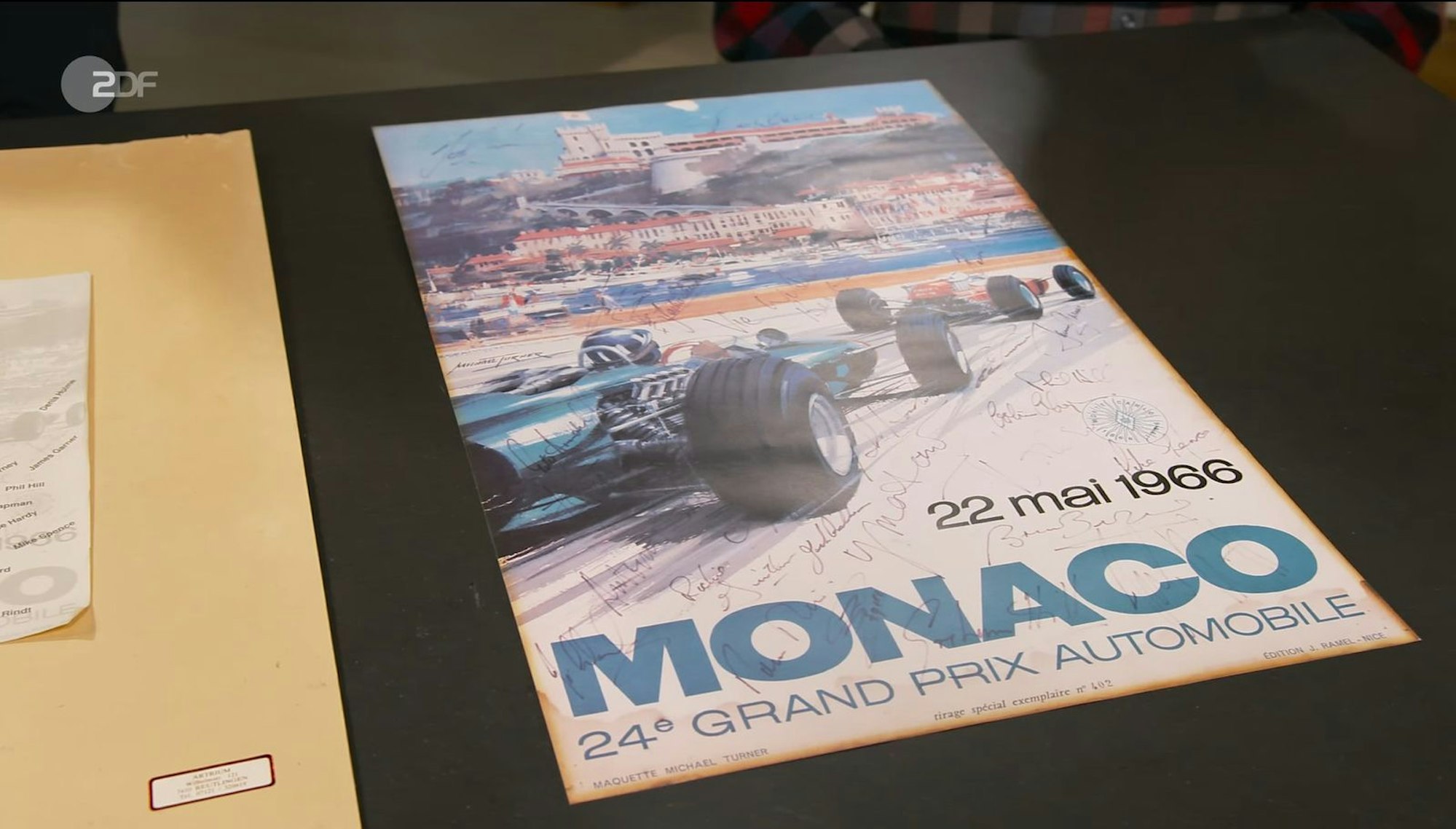 Im Trödel-Angebot diesmal: ein Erinnerungsstück an ein motorsportliches Großereignis, das sich vor fast 60 Jahren abgespielt hatte. Konkret ging es um ein Poster zum 24. Großen Preis von Monaco, datiert auf den 22. Mai 1966. (Bild: ZDF)