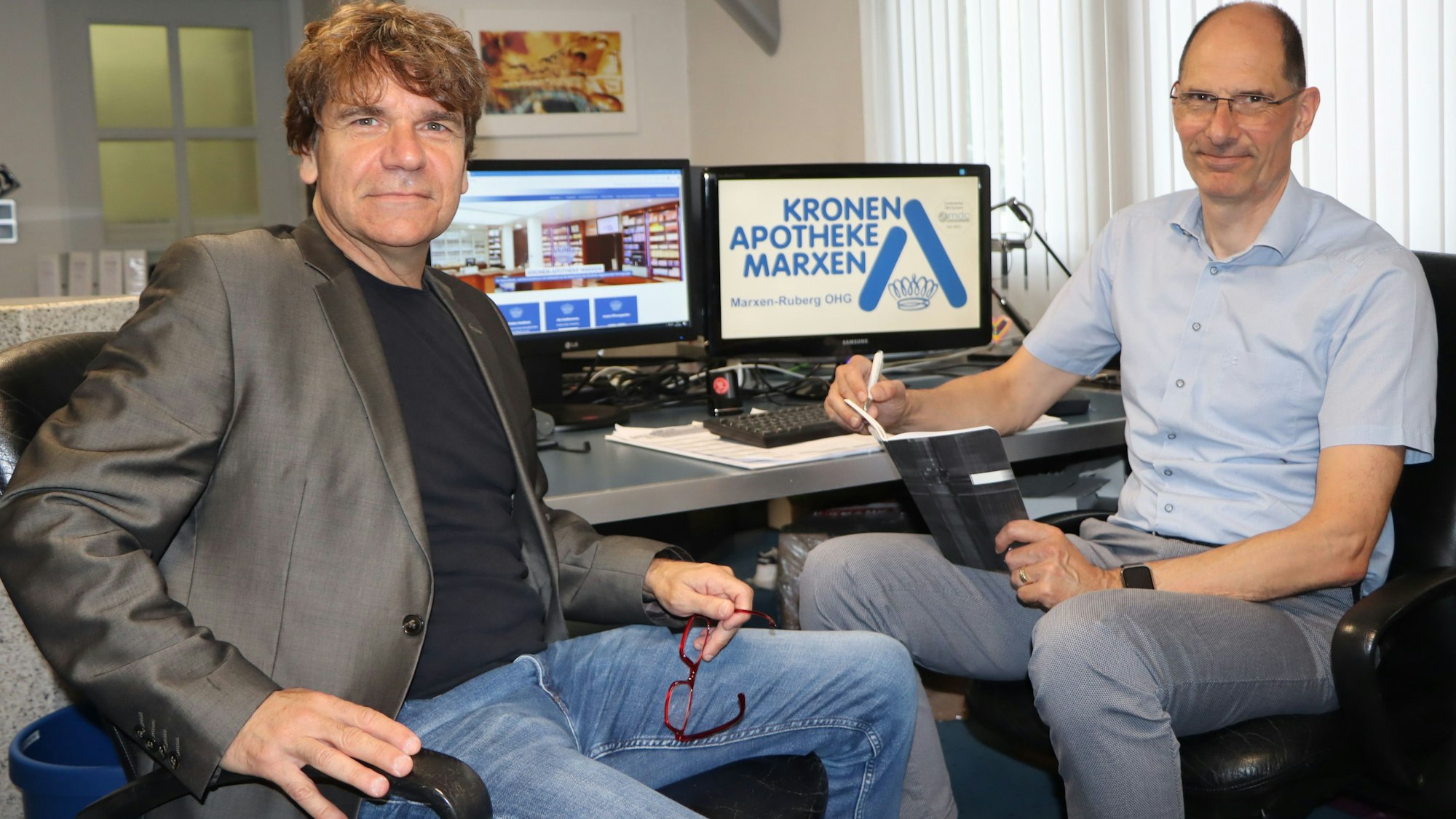 Zu sehen sind Michael Marxen und Dr. Klaus Ruberg.