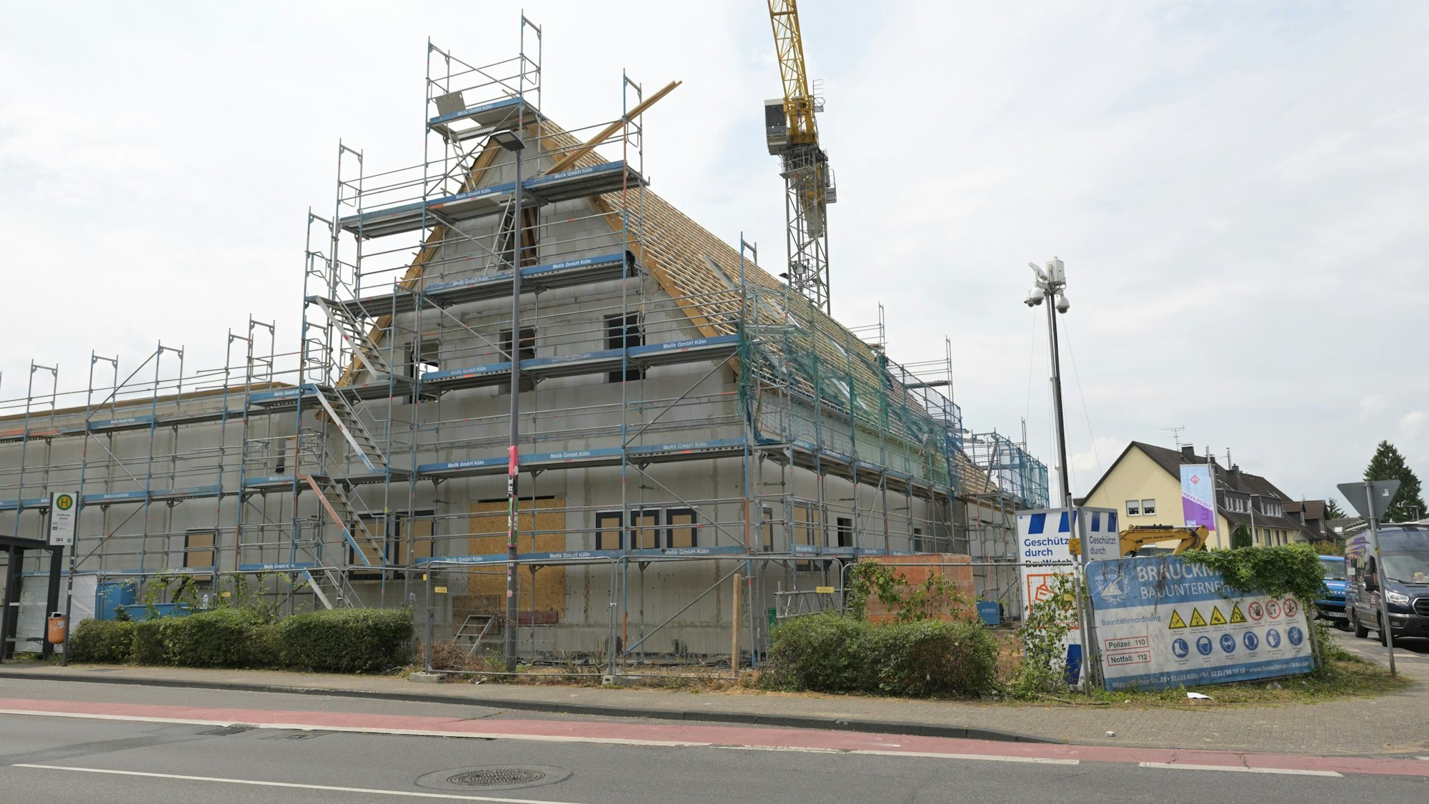 Das Foto zeigt den neuen Aldi in Heidkamp, der in seinen Konturen an die Milchsammelstelle erinnert