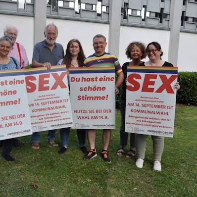 Das Bild zeigt ein Plakat mit der Aufschrift SEX.