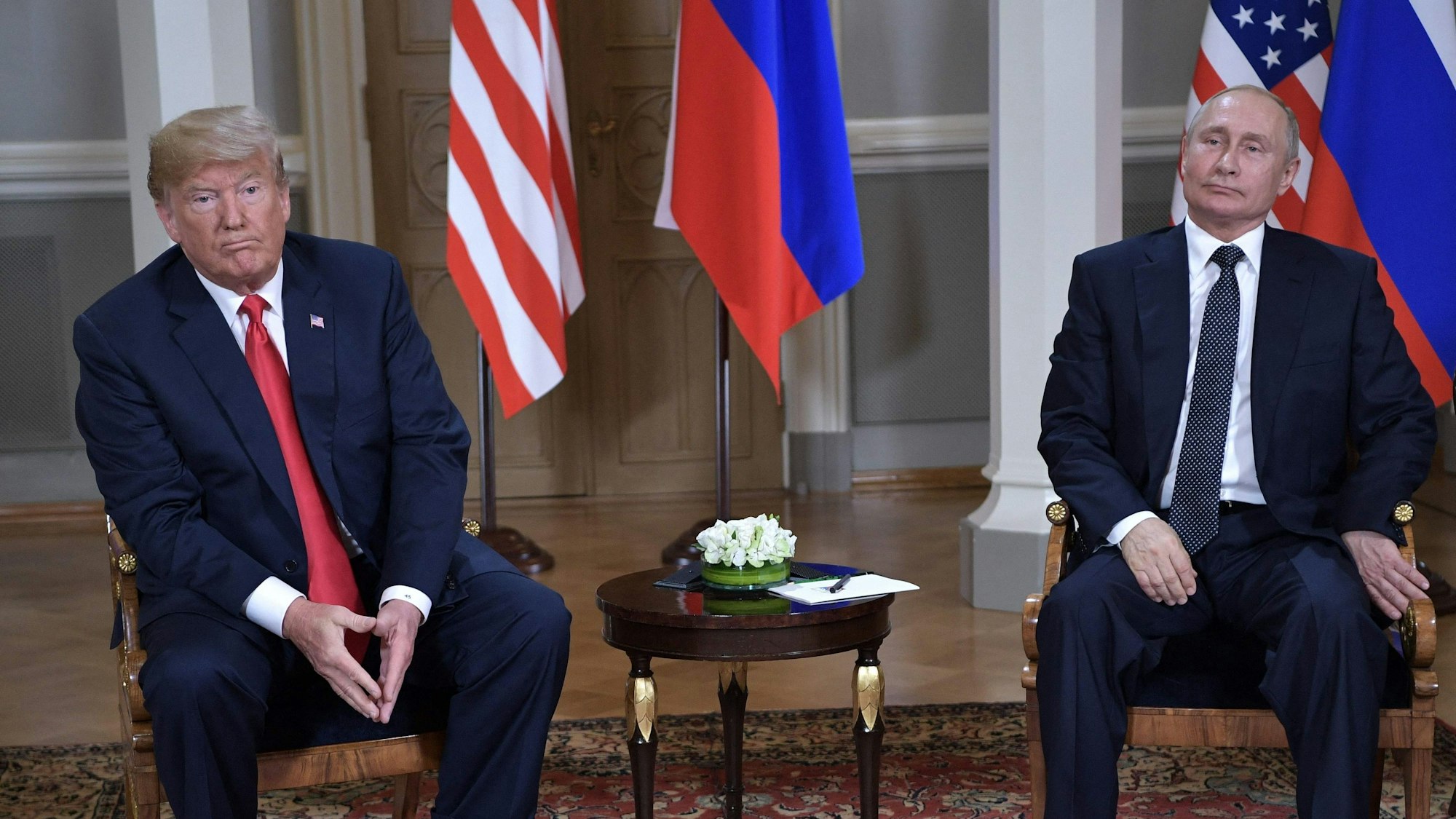 (FILES) US President Donald Trump meets with Russia's President Vladimir Putin in Helsinki, on July 16, 2018. US President Donald Trump and Russian counterpart Vladimir Putin could meet for a summit as early as next week, the Kremlin said on August 7, 2025. The meeting would be the first between a sitting US and Russian president since Joe Biden met Putin in Geneva in June 2021, and comes as Trump seeks to broker an end to Russia's military assault on Ukraine. (Photo by Alexey NIKOLSKY / Sputnik / AFP)