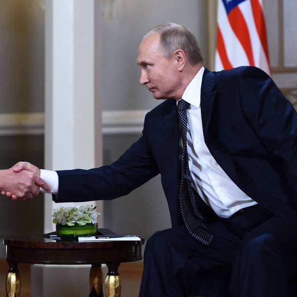 (FILES) Russian President Vladimir Putin (R) and US President Donald Trump shake hands before a meeting in Helsinki on July 16, 2018. US President Donald Trump said on August 8, 2025 he would meet with Russian counterpart Vladimir Putin on August 15 in Alaska, as the Republican billionaire hopes to help mediate an end to the war in Ukraine. (Photo by Brendan Smialowski / AFP)