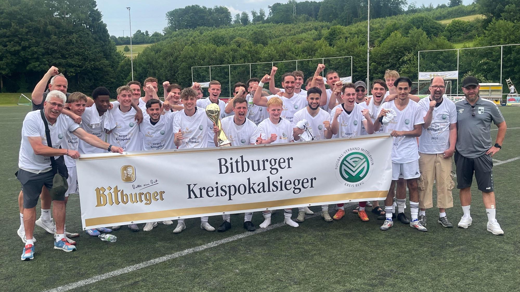Foto einer siegreichen Fußballmannschaft